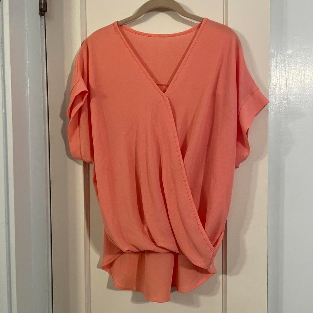Pink polyester spandex blouse